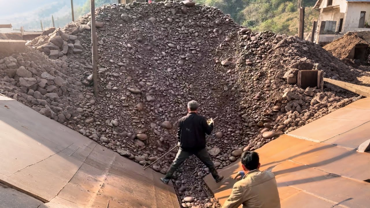 Barge unloads 3650 tons of cobblestone - smooth flow - relaxing video