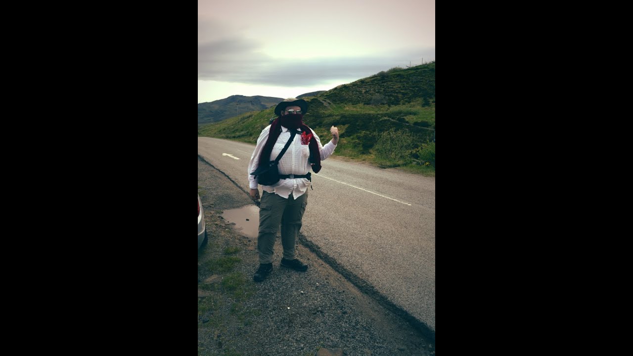 Women Picks Up Weird Hitchhiker