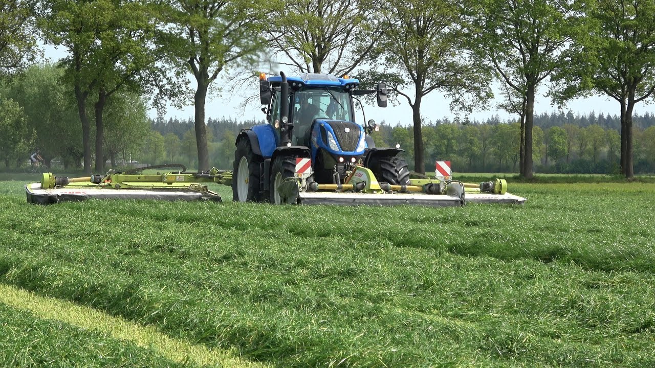 Gras maaien door Grefelman met New Holland T7.270 + Claas Disco 1100 C triple maaier (2024)