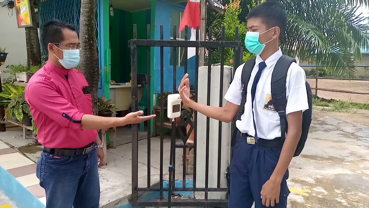 TATA CARA MASUK SEKOLAH DALAM MASA PANDEMI DENGAN MENERAPKAN PROKES-UNTUK KELAS VII SMP TUNAS BARU