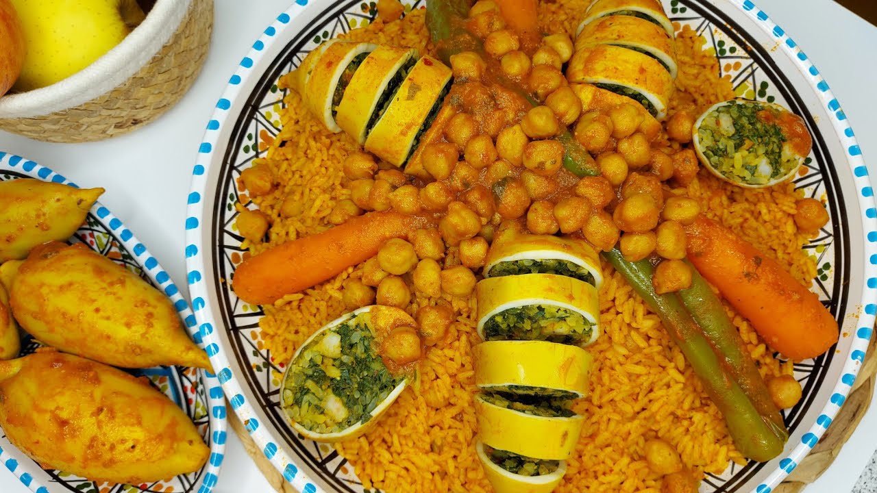 روز تونسي بطريقة جديدة يجي فارك كل كعبة وحدها|كلمار محشي بنة ولا اروع|Riz tunisien|Calamars farcis