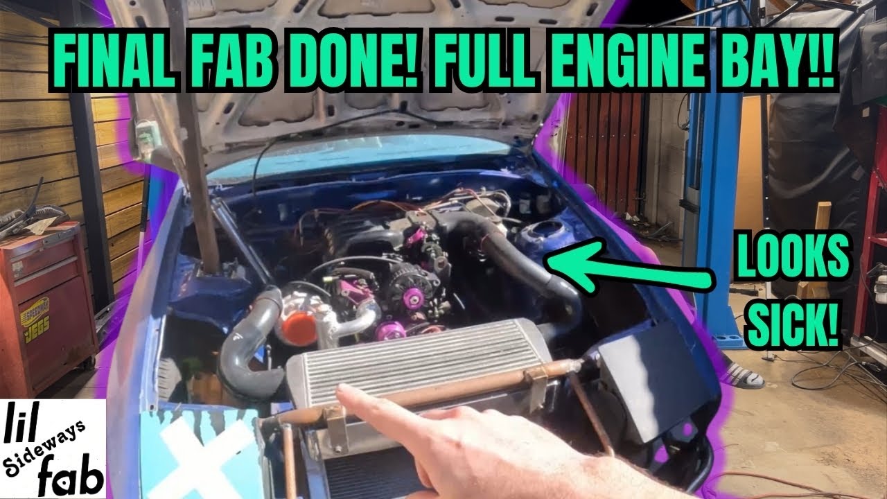 THE RX7 HAS A COMPLETE ENGINE BAY AND IT LOOKS CRAZY!!