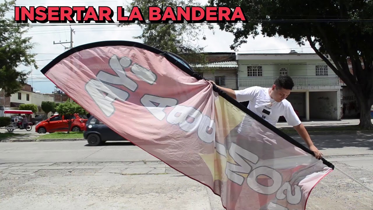 INSTALACIÓN DE BANDERAS PUBLICITARIAS - ALPHA GRAPHIC
