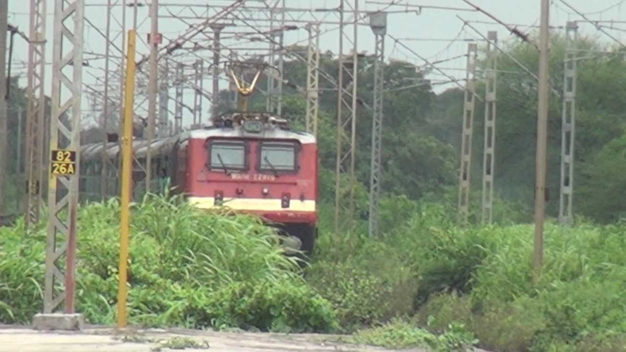 FIRST AC BRC WAP-4E# 22919 COMING OUT OF LUSH GREEN VEGETATION OF KELVE ROAD