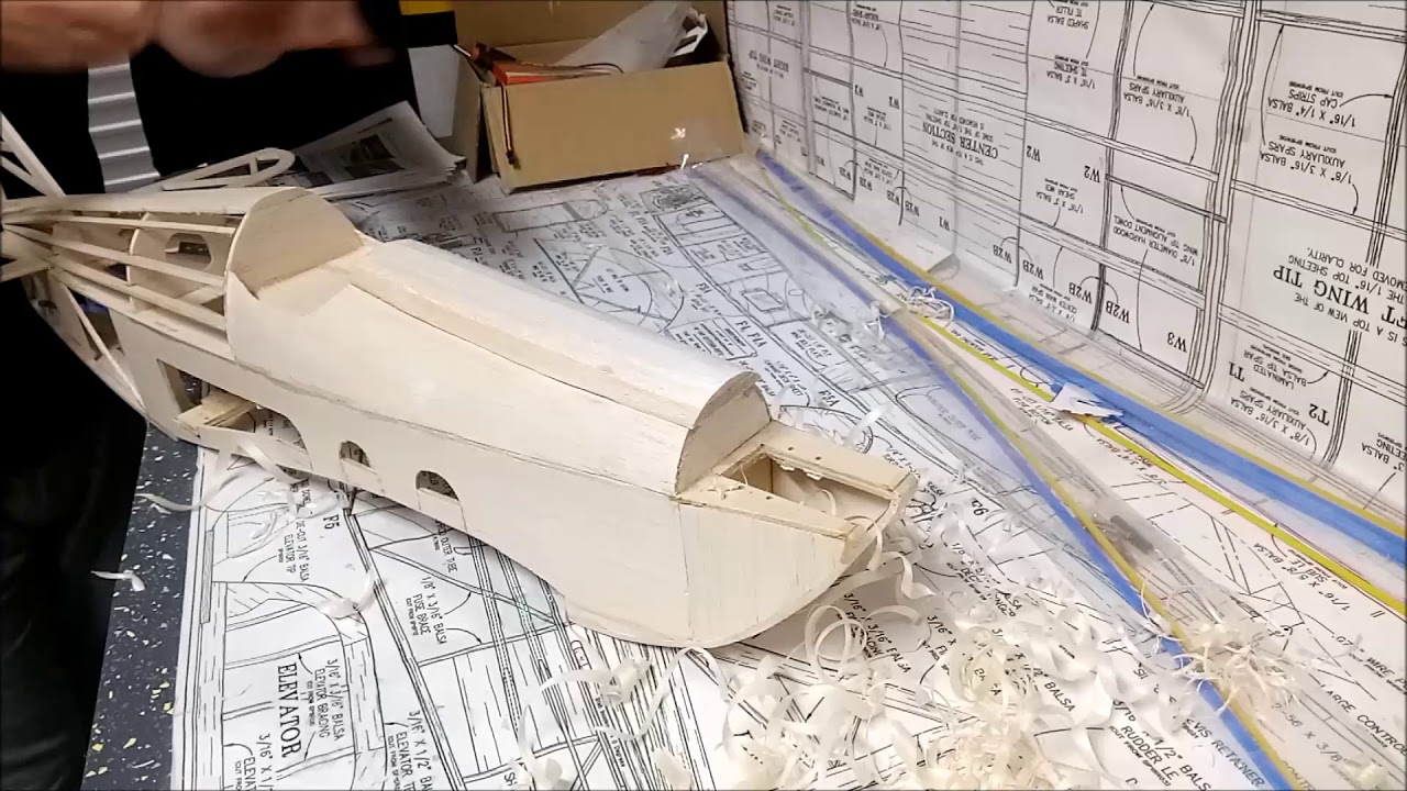 Working and shaping balsa wood.