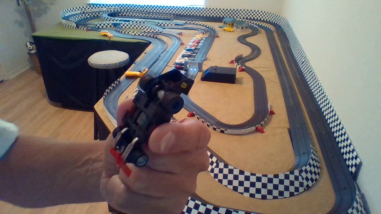 Slot car race track - some fast cars with hop-ups Tyco and Life Like