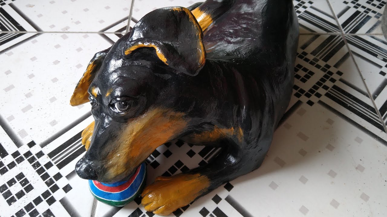 Cachorro de cimento para jardim