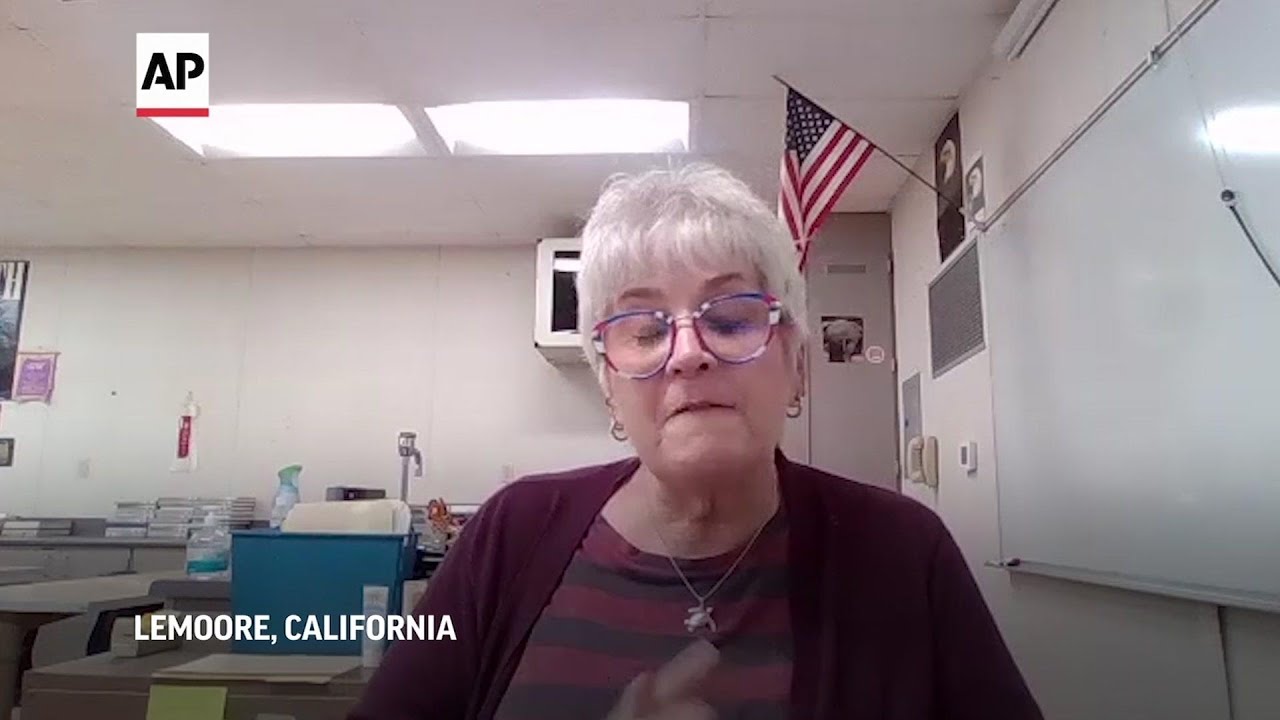 Teacher passes guide dog legacy to students