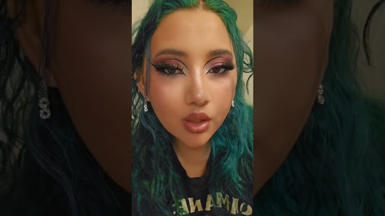 Edgy makeup with green hair