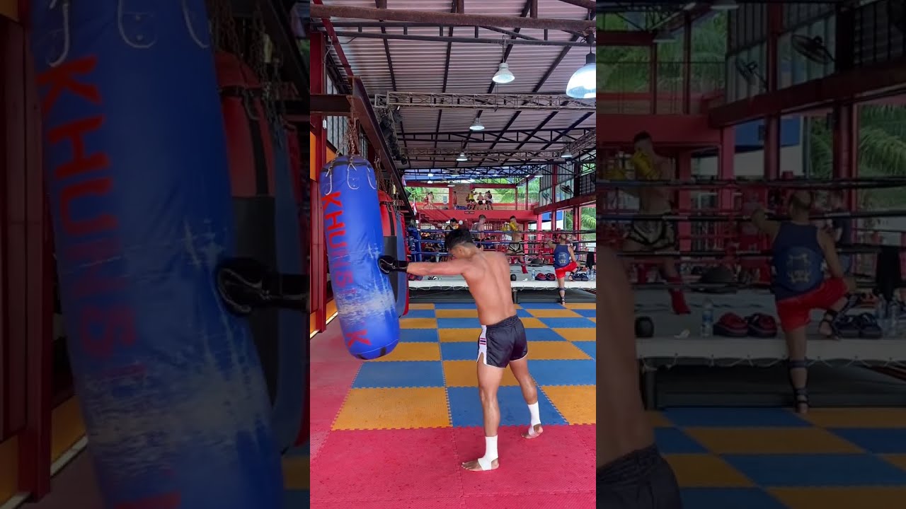 Muay Thai training with sandbags