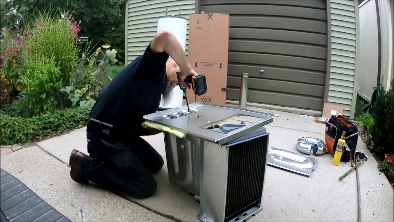 Assembling a 90% eff. Carrier heat exchanger part 1