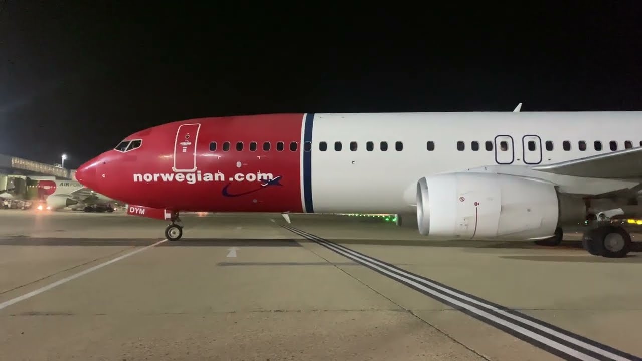 Norwegian airlines Boeing 737-800 arriving on stand with engine spool down (close)