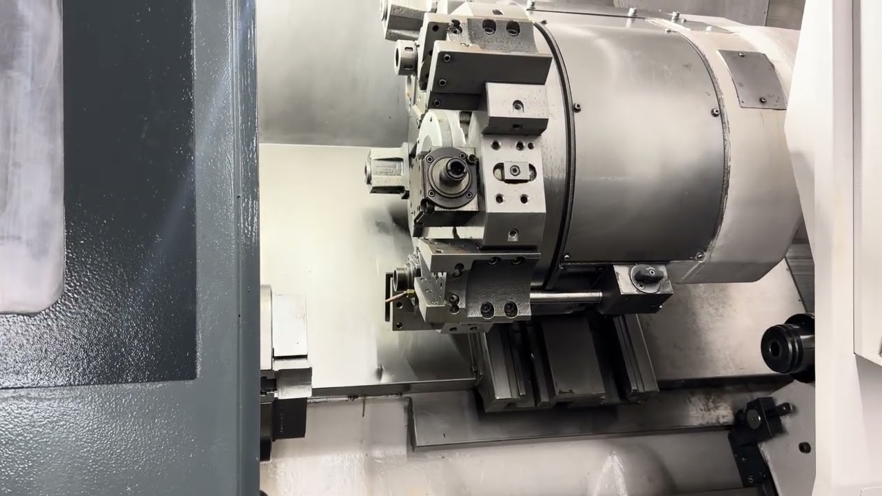 Токарный станок с ЧПУ Mori Seiki SL-25MC 1995 года выпуска с приводным фрезерным станком и осью C.