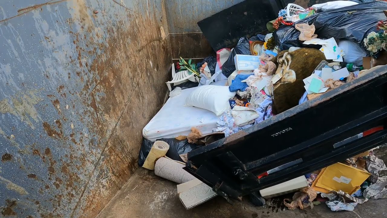 Compactor vs couches, mattresses, truck and trailer load garbage 