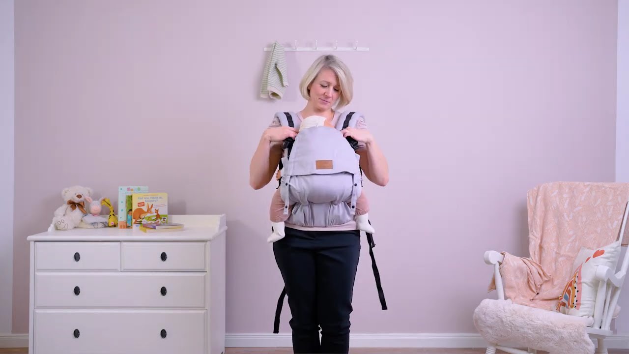 Baby mit Tragehilfe STELLA auf den Rücken und zurück