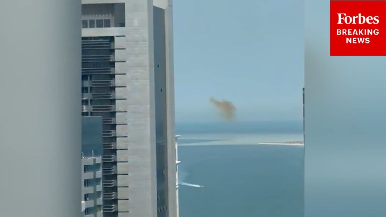 RAW VIDEO: Smoke Seen Rising Outside Of Over Doha, Qatar, As War Rages Across Middle East