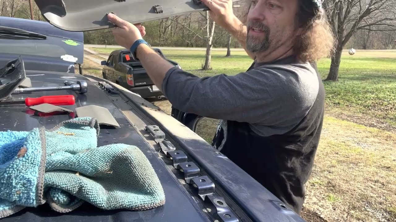 Replacing Honda Element Roof Plastic.