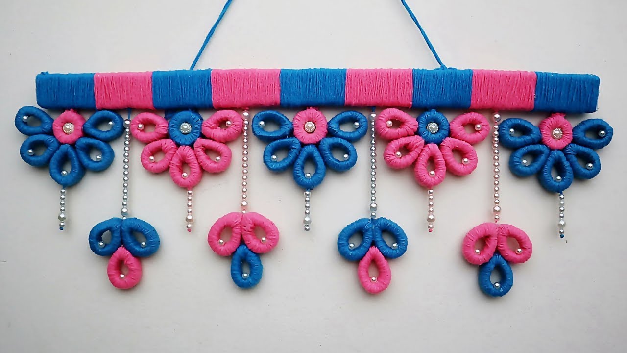 Самодельная шерстяная подвеска-торан для украшения двери на Дивали | Лучшее из шерсти и газеты