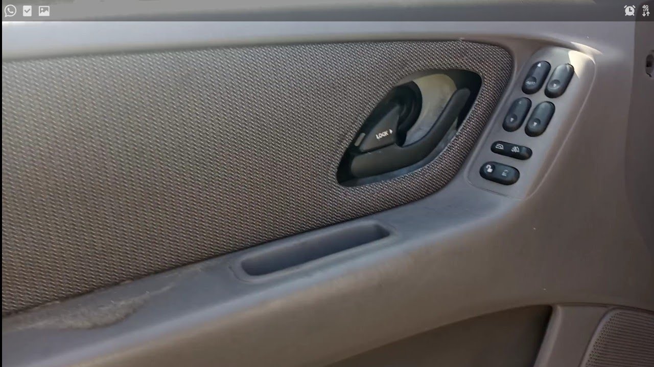 como remplazar manija interior,2000/07 Ford escape