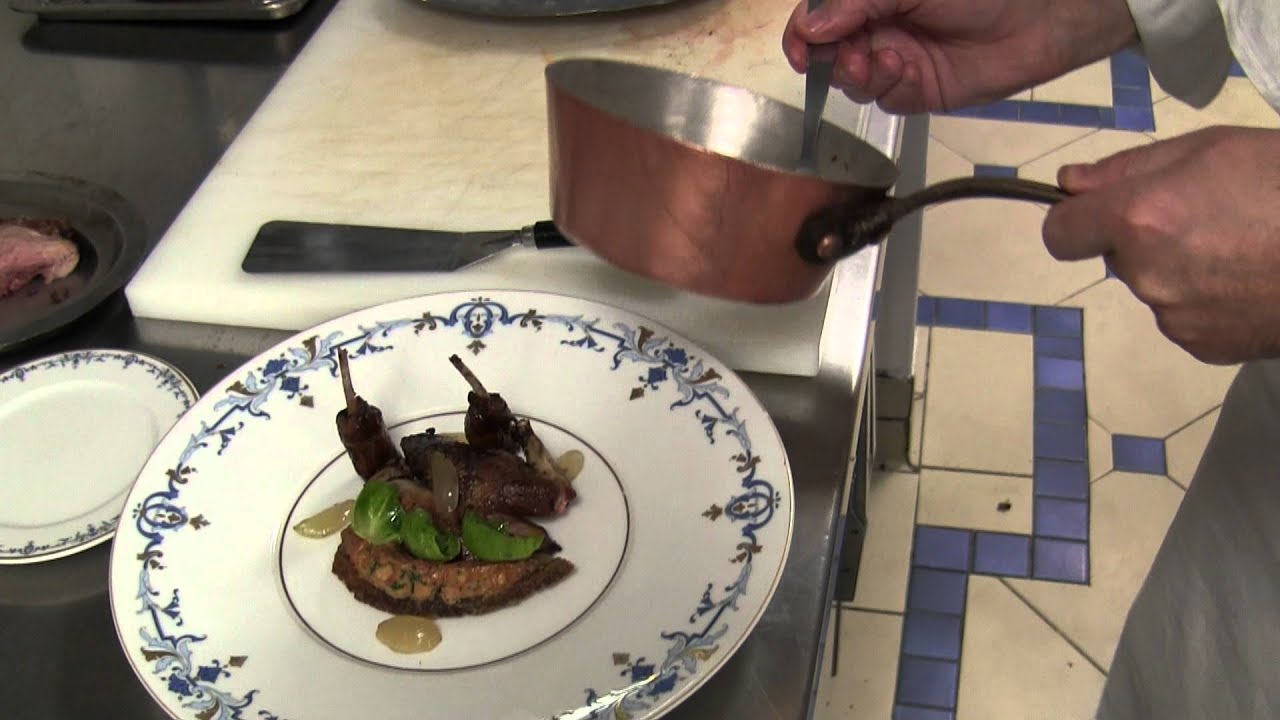 Michel Roth prepares a main course at the Ritz Paris