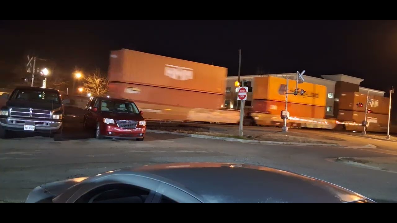 Union pacific takes NS I78 along with NS engine across east washington street