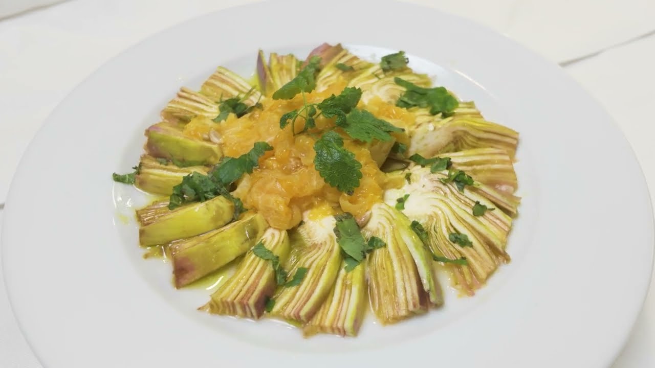 Carpaccio di carciofi con ragù di mandarino