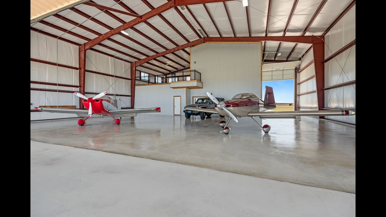 Airplane Hangar Living At It's Finest