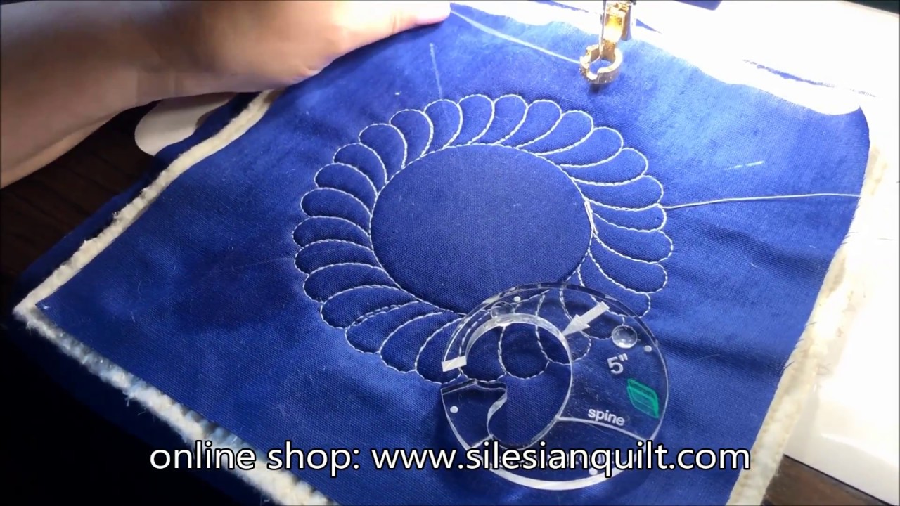 Feather in a circle 5 inches