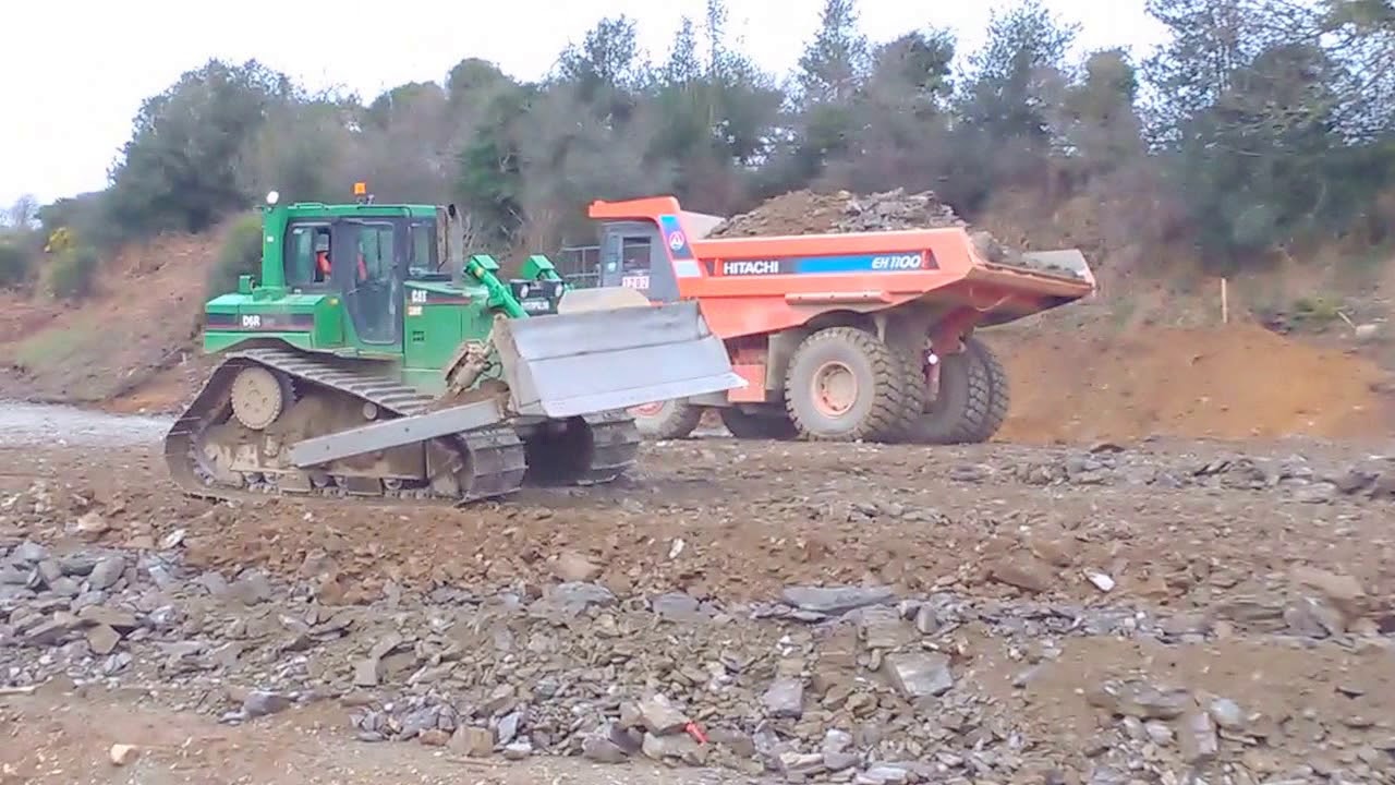 CAT D6R LGP bulldozer working pushing rock for road construction #1