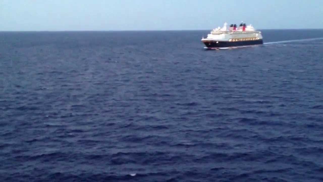 Disney Dream passing Disney Magic ship in Carribbean for Horn Sound Off.