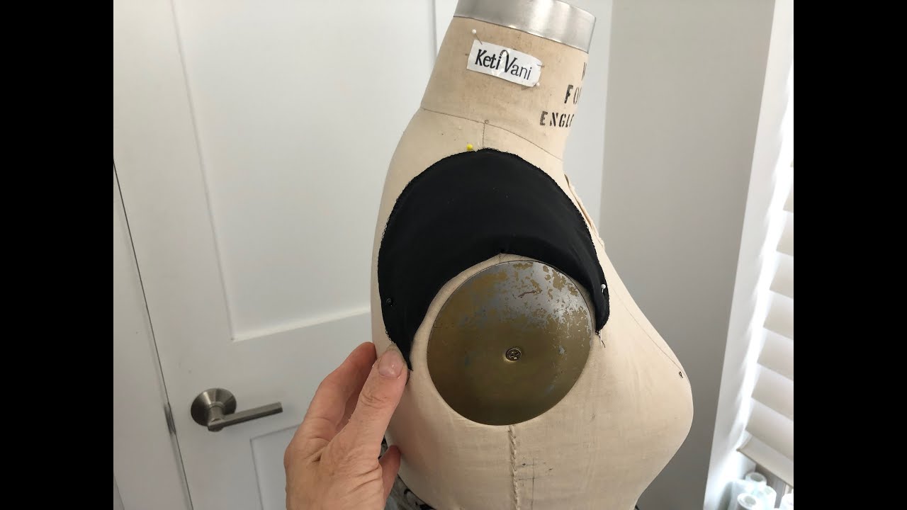 How to cover white shoulder pad with the dark fabric or lining.