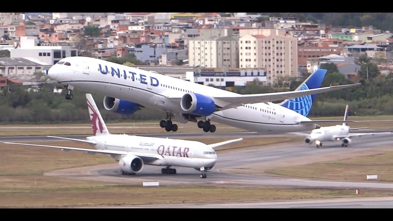 Boeing 787-9 pousando & 787-10 decolando na pista principal 10L no Aeroporto de Guarulhos