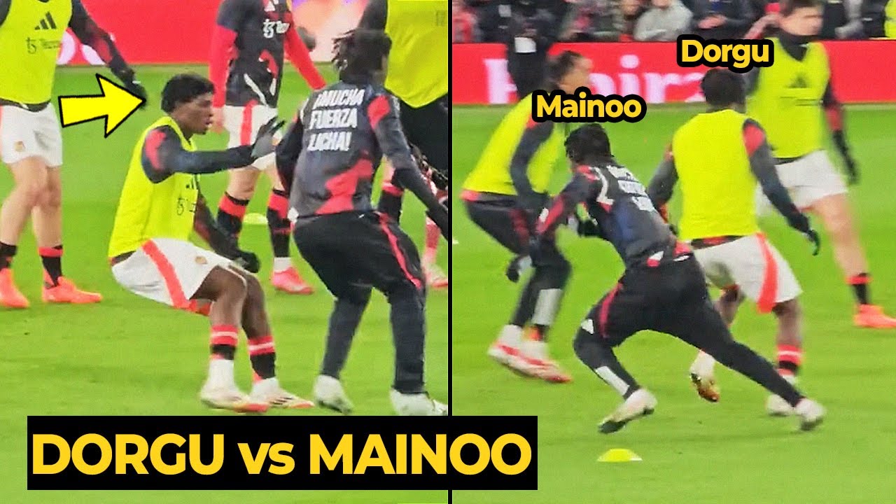 Patrick Dorgu challenges Kobbie Mainoo during rondo training before the Tottenham match