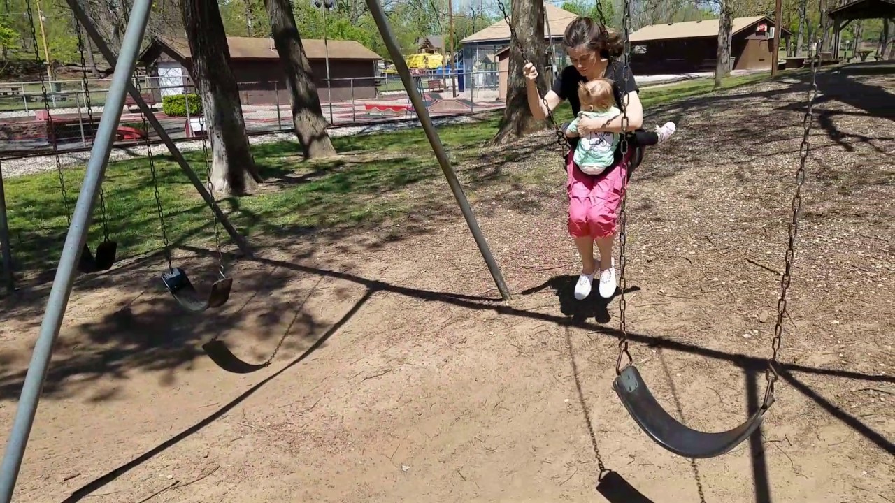Madison and mom swinging