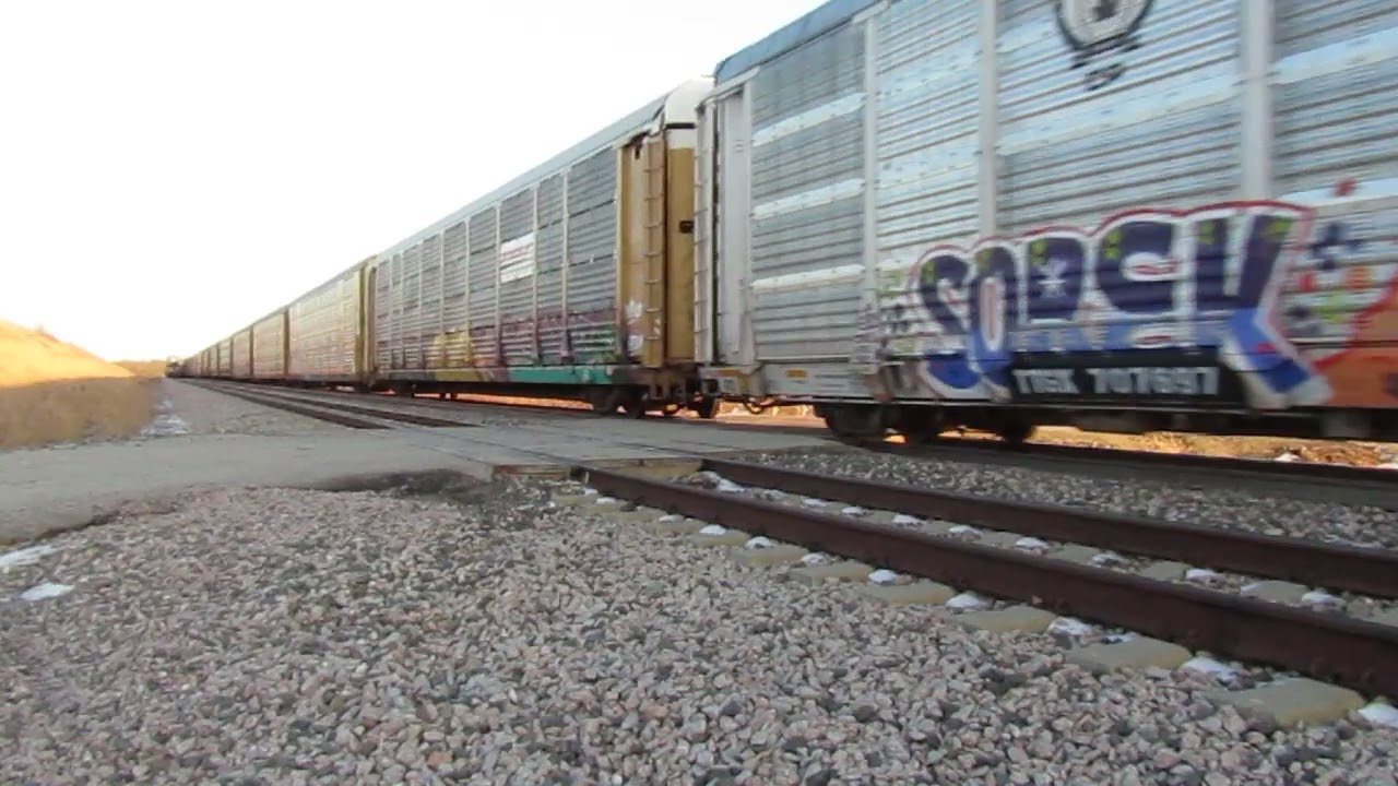 Bnsf 6175 leads a westbound auto rack train on the avard subdivision 2/26/22