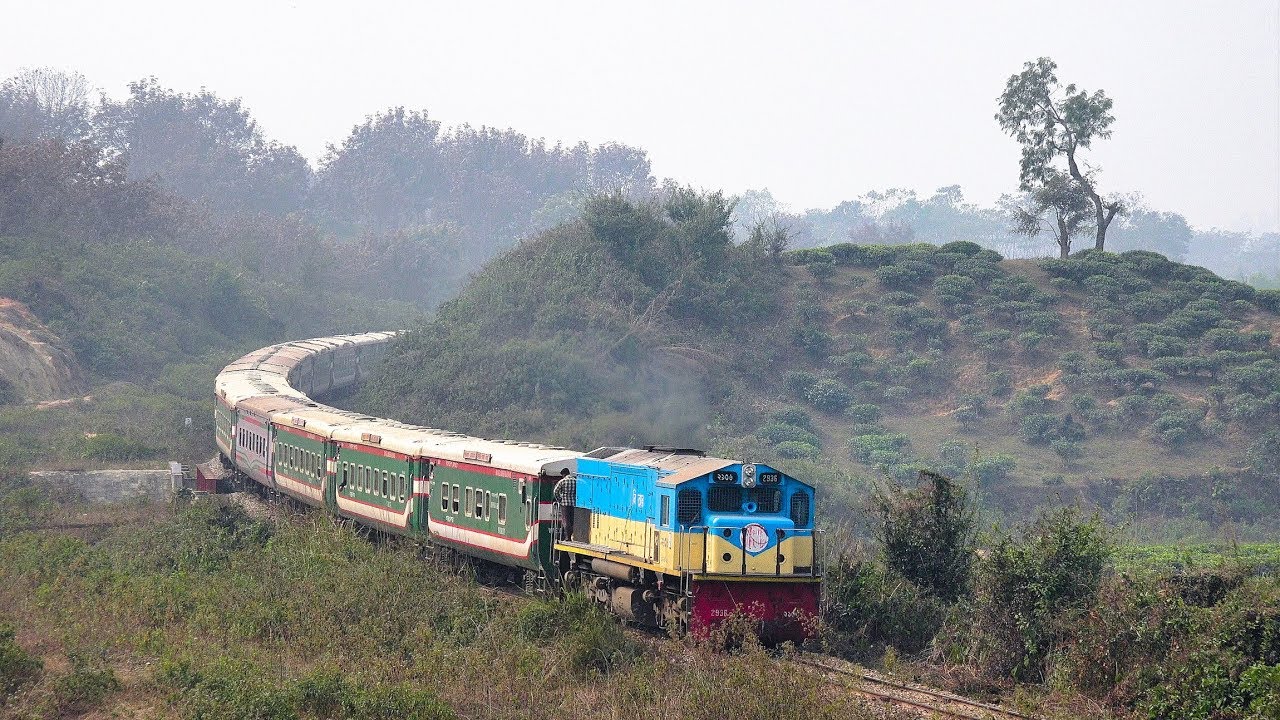 Parabat Express Train passing between hills at Panchanag, Sreemangal