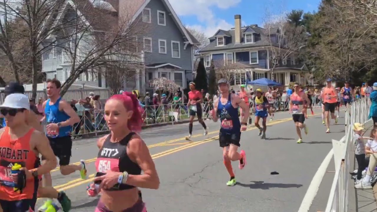 Runners push through Heartbreak Hill during the 2024 Boston Marathon