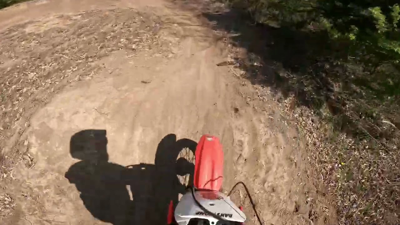 Ripping the 75 Honda around the compound 