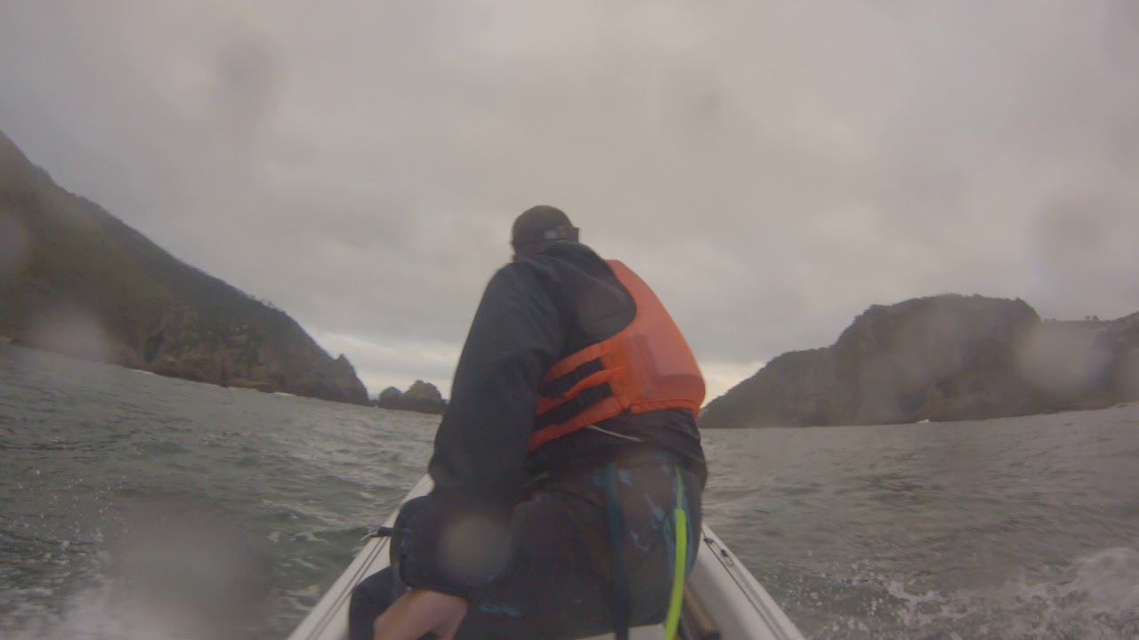 Navigating the Knysna Heads on a rough day on a 14ft Skiff