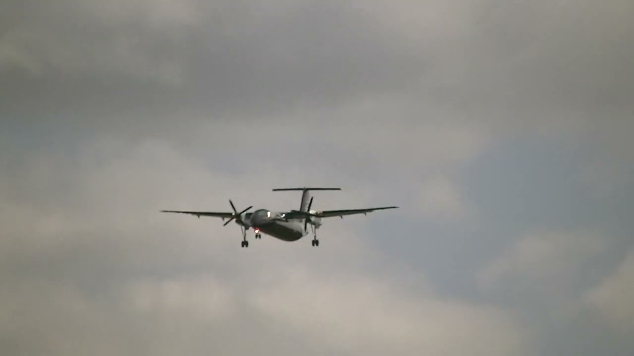 black livery dash 8 returning from Hokitika