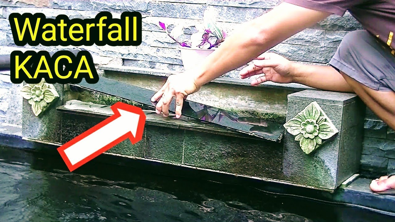Pemasangan kaca pada air terjun kolam koi
