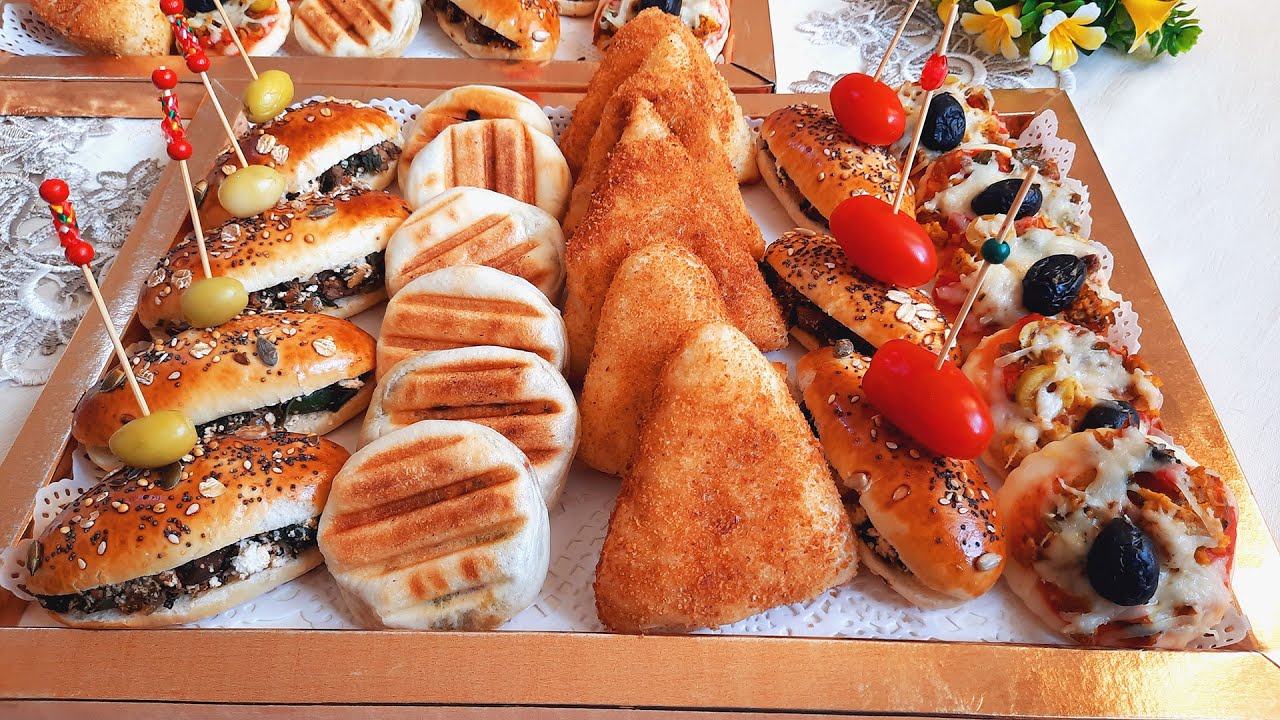حتى حاجة مصعيبة😉بعجينة 1 تخرجي العجب/بلاطو مملحات ب4اشكال وحشوات مختلفة للبنات لي بغاو يخدمو ليكموند