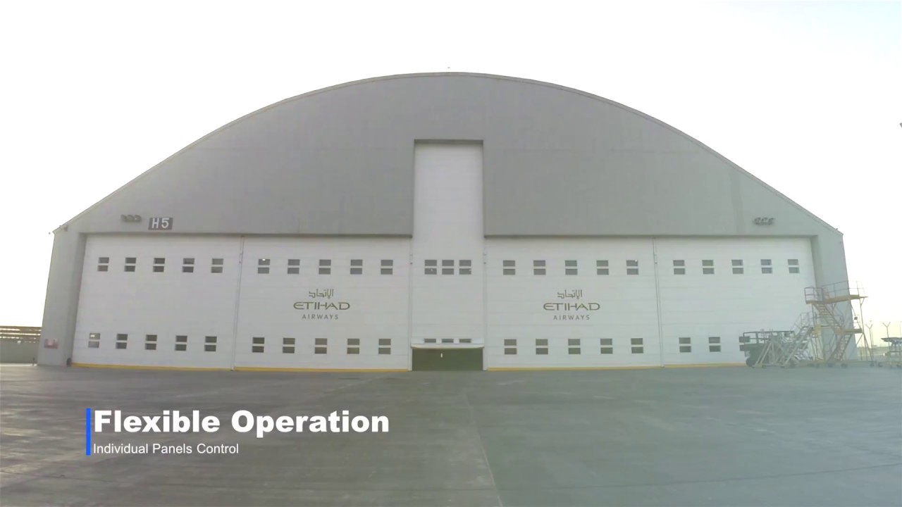 Champion Door - Vertical Lifting Aircraft Hangar Fold-up Doors
