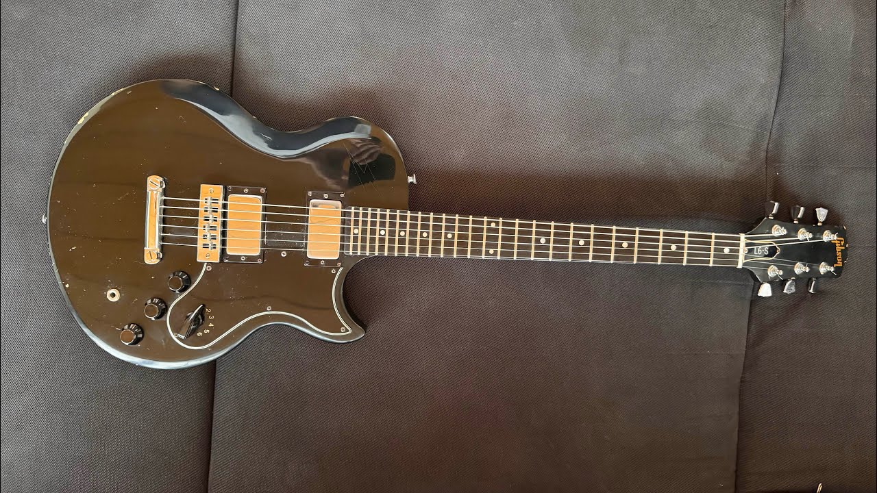 Vintage Gibson L6-S Custom Ebony from 1976 Bill Lawrence Pickups/ What about this Santana guitar?