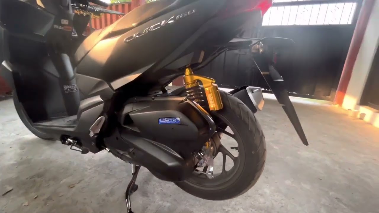 click 160 change shock 330mm to 300mm