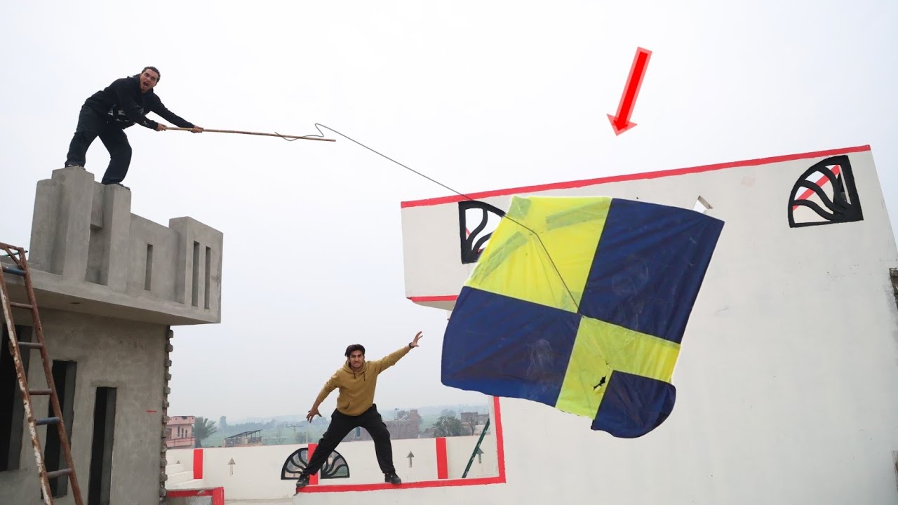 Yellow Black Kite Catch Abubaker Roof With White Black Bhoot Attack