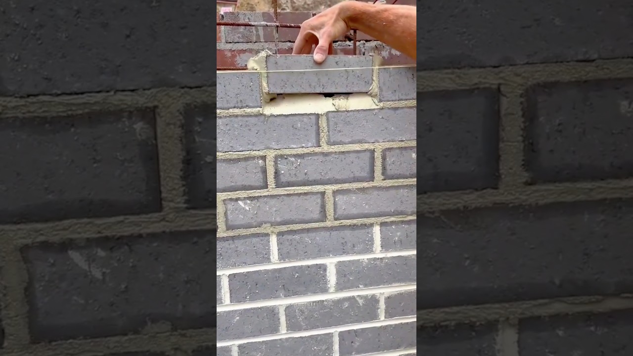 Carefully Laying Bricks to Create a Straight and Even Wall Structure