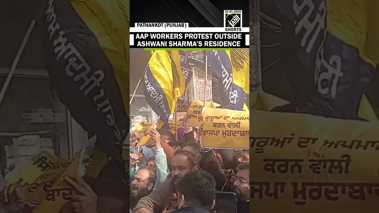 AAP workers protest outside the residence of Punjab BJP working President Ashwani Sharma