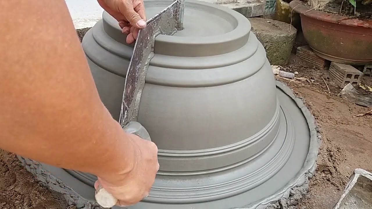 Model 70h. quay chậu xi măng70cm. 70cm cement pot.