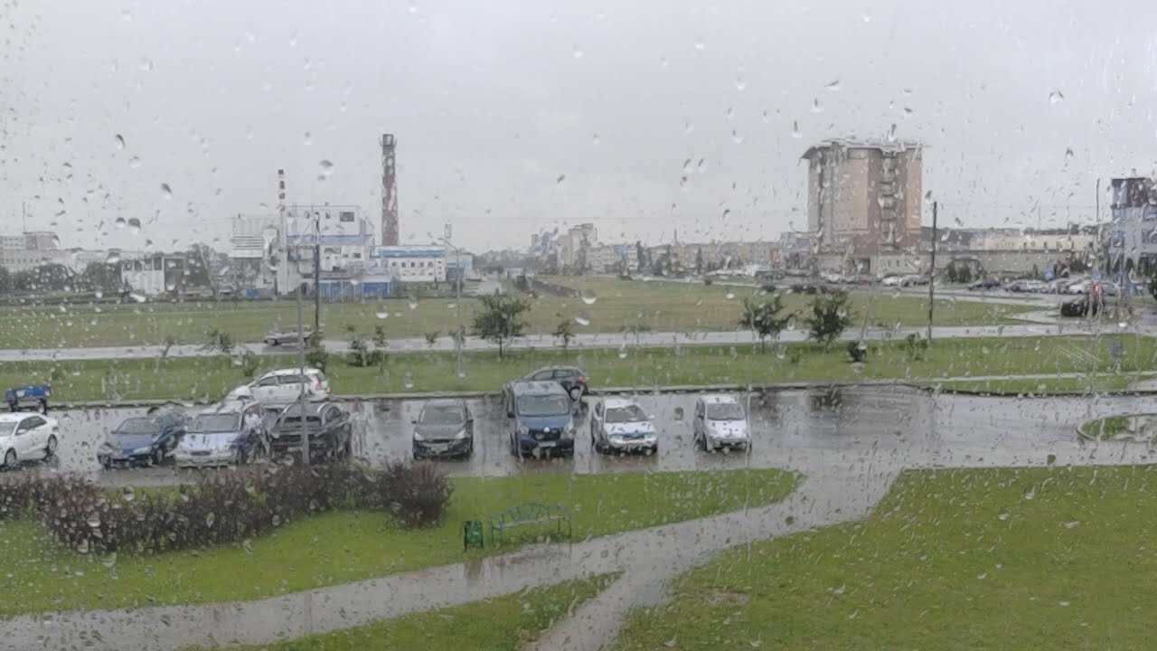 Сильный дождь вид с лоджии 26 июля. 